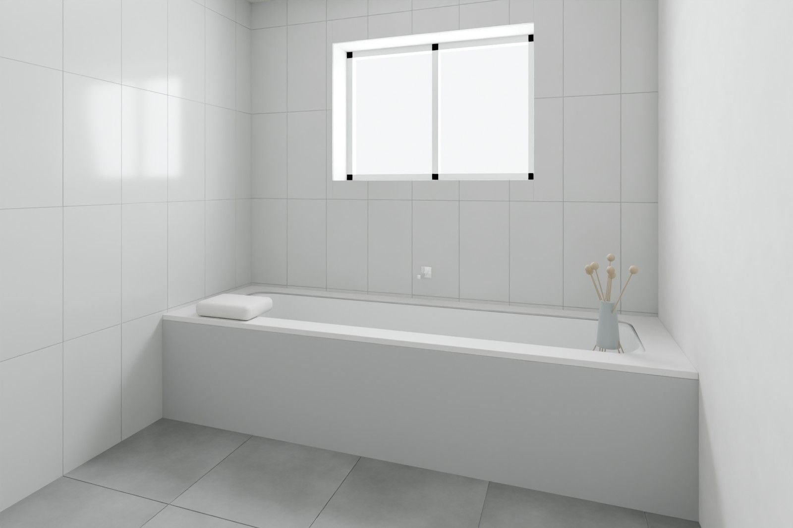 Bad mit grauen Wandfliesen im Hochformat, eingefliester Badewanne unter einem Fenster